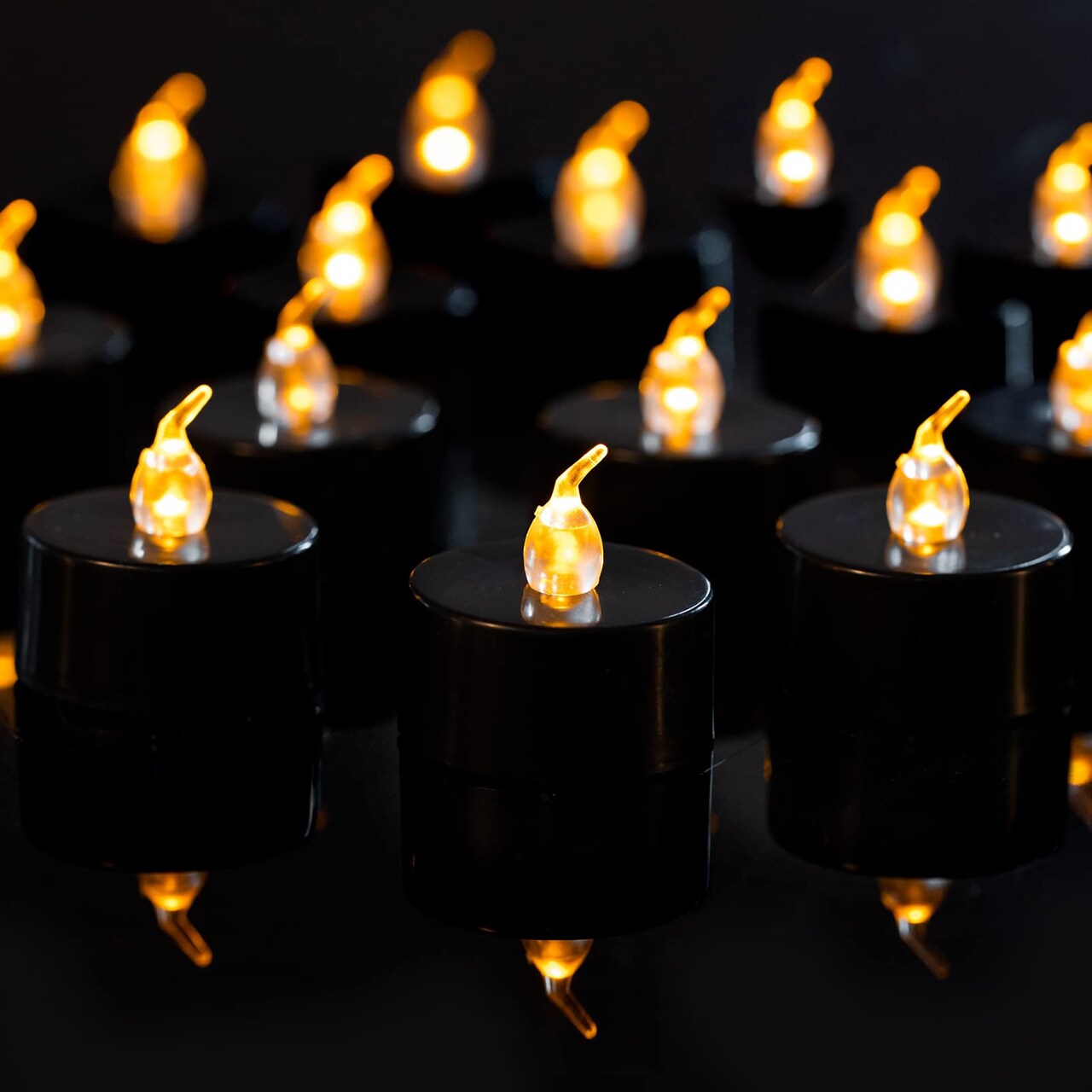 24 Pack Black Tea Lights Candles, Flickering Warm Yellow Flameless LED Tealights, Long Lasting Battery Operated Fake Candles, Decoration for Wedding, Halloween and Christmas